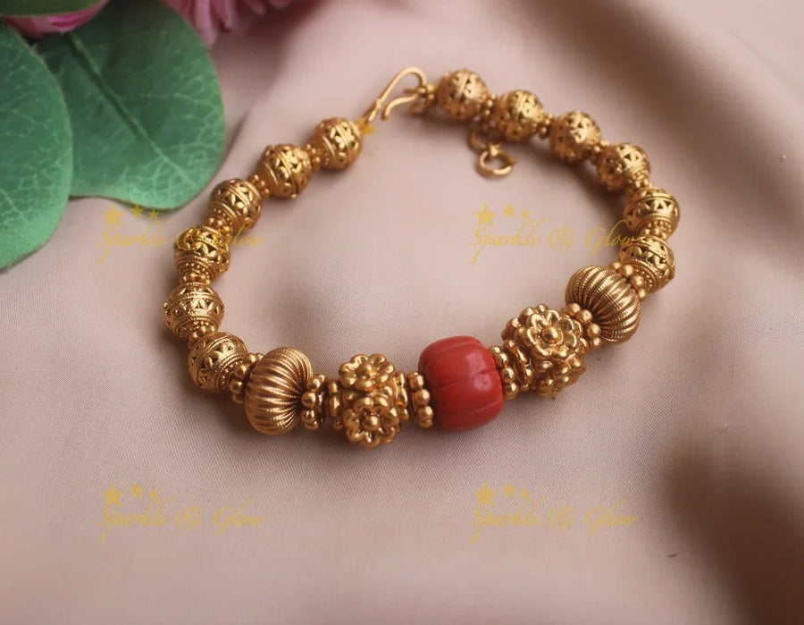 Elegant Gold and coral beaded bracelet - Sparkle and Glow