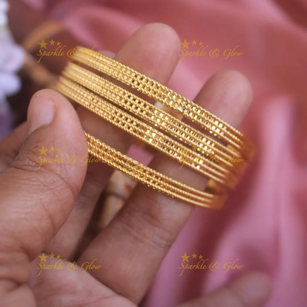 Elegant Gold polished Three line bangles two pairs, 2.4 - Sparkle and Glow