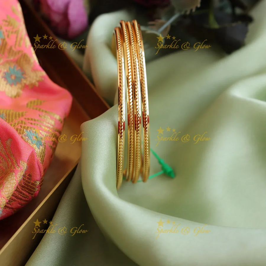 Gold polished Daily wear bangles two pairs - Sparkle and Glow