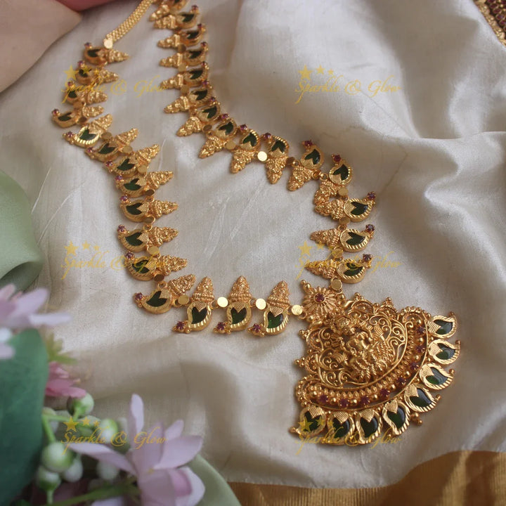 Gorgeous Lakshmi pendant mango green palakka kerala style long necklace with ruby stones - Sparkle and Glow