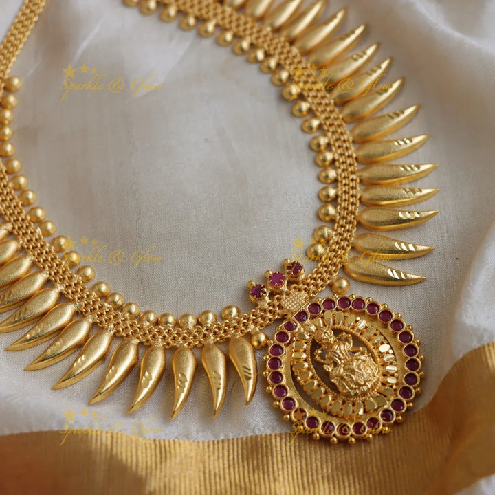 Beautiful Lakshmi pendant spike kerala style short necklace with ruby stones and gold beads - Sparkle and Glow