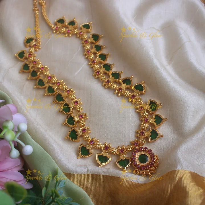Statement Leaf shape green palakka kerala style long necklace with ruby stones and gold beads - Sparkle and Glow