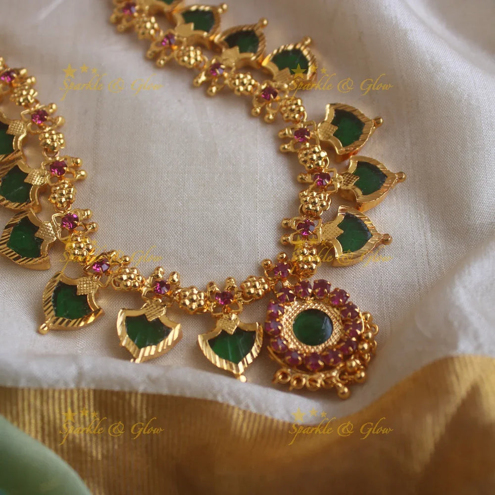 Statement Leaf shape green palakka kerala style long necklace with ruby stones and gold beads - Sparkle and Glow