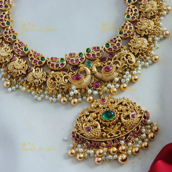 Stunning Peacock carved gutta pusalu short necklace with ruby emerald and gold beads - Sparkle and Glow