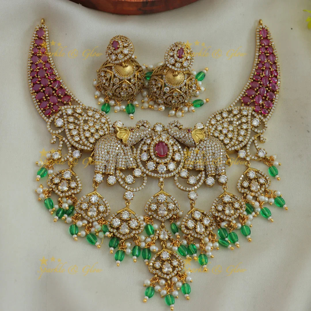 Beautiful Elephant and leaf design AD short necklace with ruby pearls and green beads - Sparkle and Glow