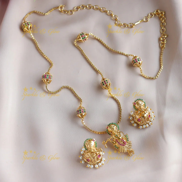 Beautiful gold alike krishna pendant chain haram with multi colour stones - Sparkle and Glow