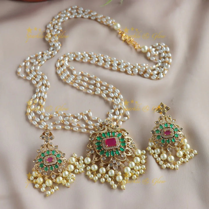Gorgeous Floral peacock pendant haram with multi layer rice pearl chain and ruby emerald - pink - Sparkle and Glow