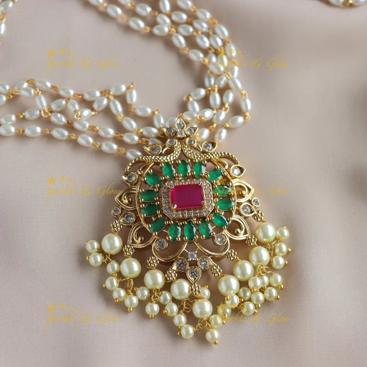 Gorgeous Floral peacock pendant haram with multi layer rice pearl chain and ruby emerald - pink - Sparkle and Glow