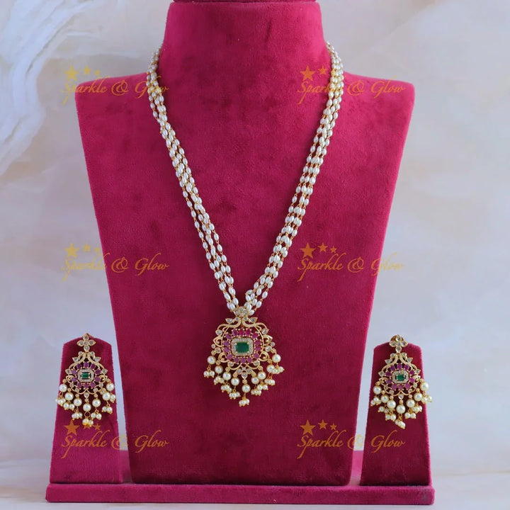 Gorgeous Floral peacock pendant haram with multi layer rice pearl chain and ruby emerald - pink - Sparkle and Glow