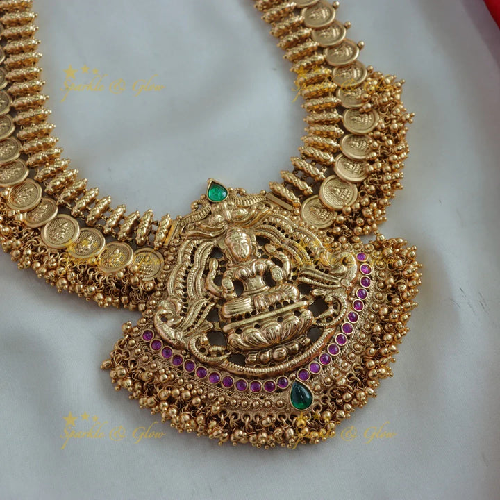 Statement Lakshmi coin long necklace with ruby emerald and cluster gold beads with maang tikka - Sparkle and Glow