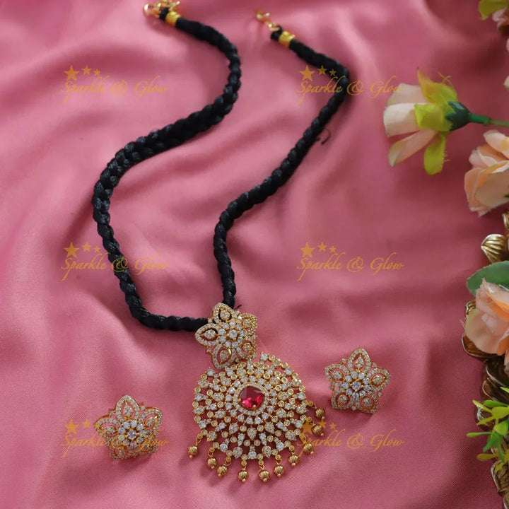 Elegant Floral pendant black thread short necklace with gold beads and ruby - Sparkle and Glow