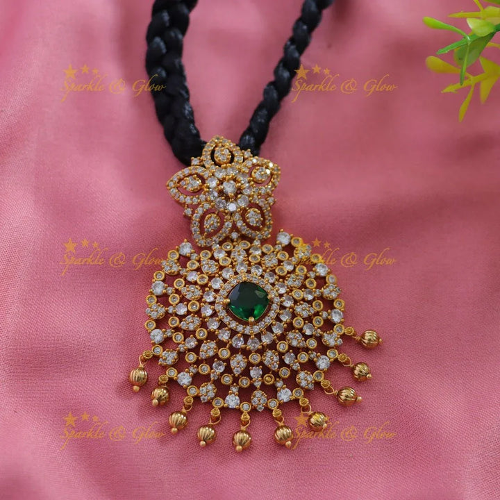 Elegant Floral pendant black thread short necklace with gold beads and ruby - Sparkle and Glow
