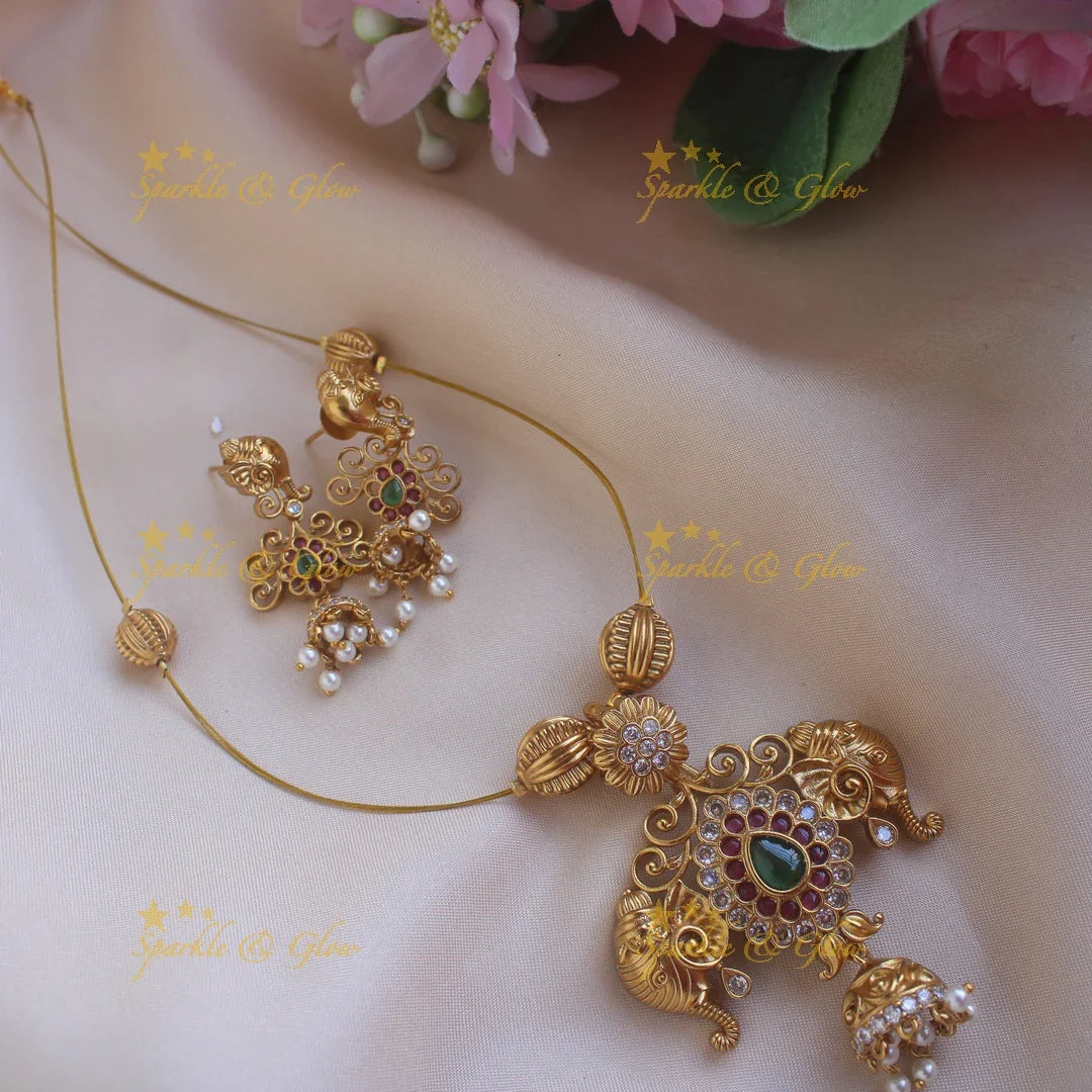 Elegant Elephant Floral carved Invisible Necklace with jhumuka drops - Sparkle and Glow