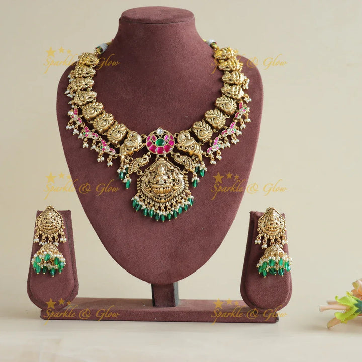Exclusive Lakshmi peacock jadau short necklace with pearls and green beads - Sparkle and Glow