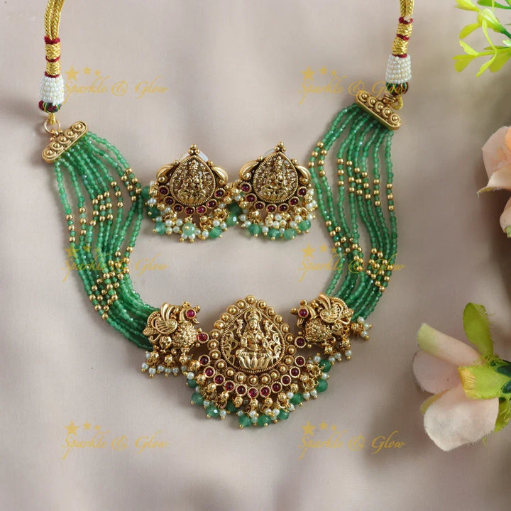Statement Lakshmi Peacock carved choker with ruby, multi layer gold and mint green beads - Sparkle and Glow