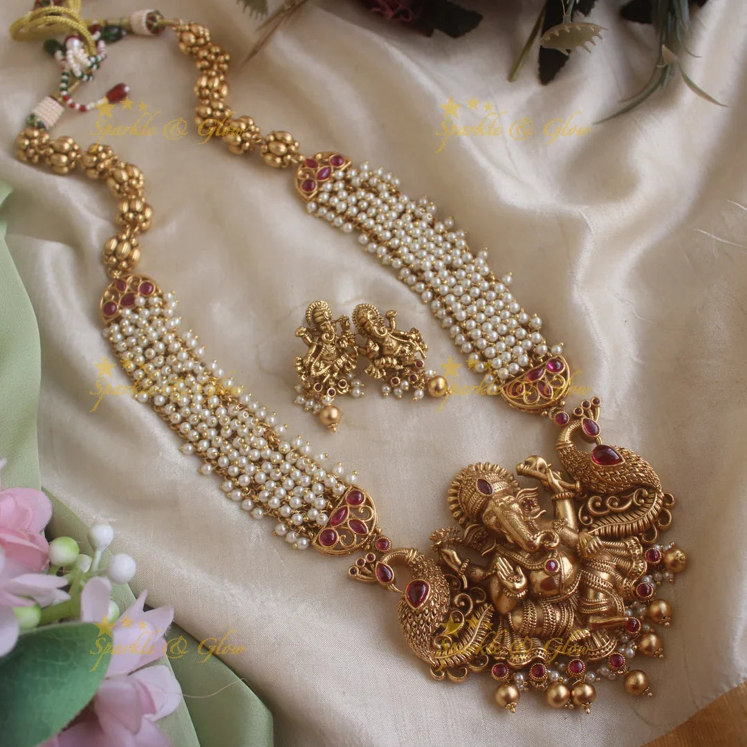 Gorgeous Ganesha peacock carved cluster pearl long necklace with ruby stones and gold beads - Sparkle and Glow