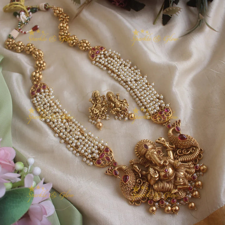 Gorgeous Ganesha peacock carved cluster pearl long necklace with ruby stones and gold beads - Sparkle and Glow