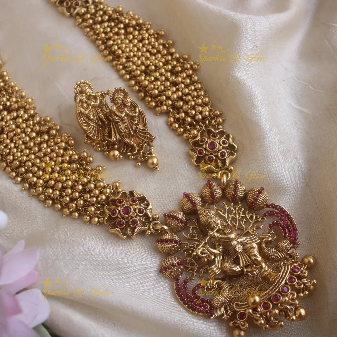 Exclusive Krishna playing flute carved cluster gold long necklace with ruby stones and gold beads - Sparkle and Glow