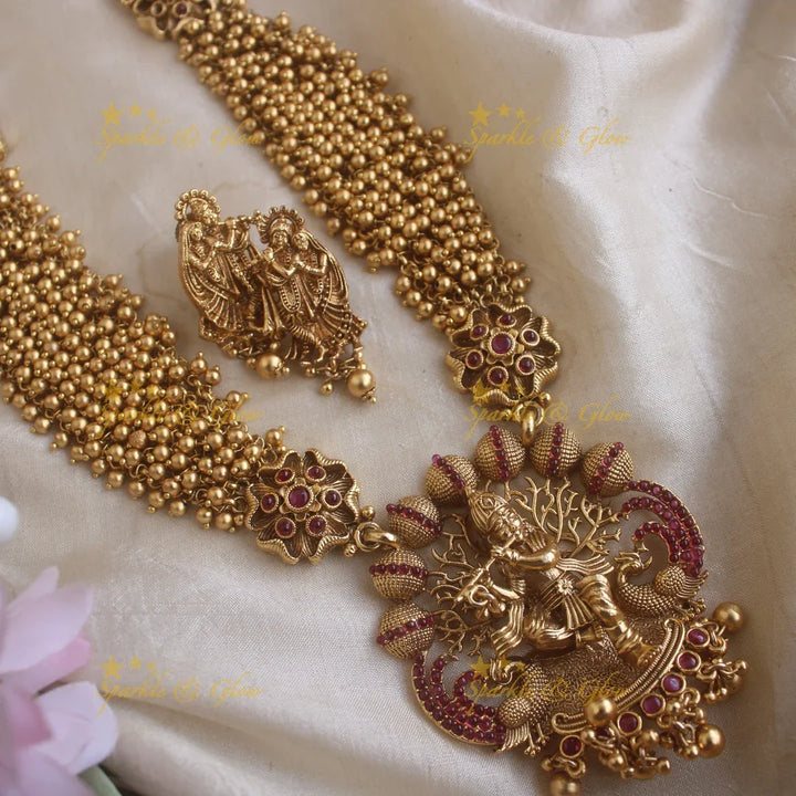 Exclusive Krishna playing flute carved cluster gold long necklace with ruby stones and gold beads - Sparkle and Glow