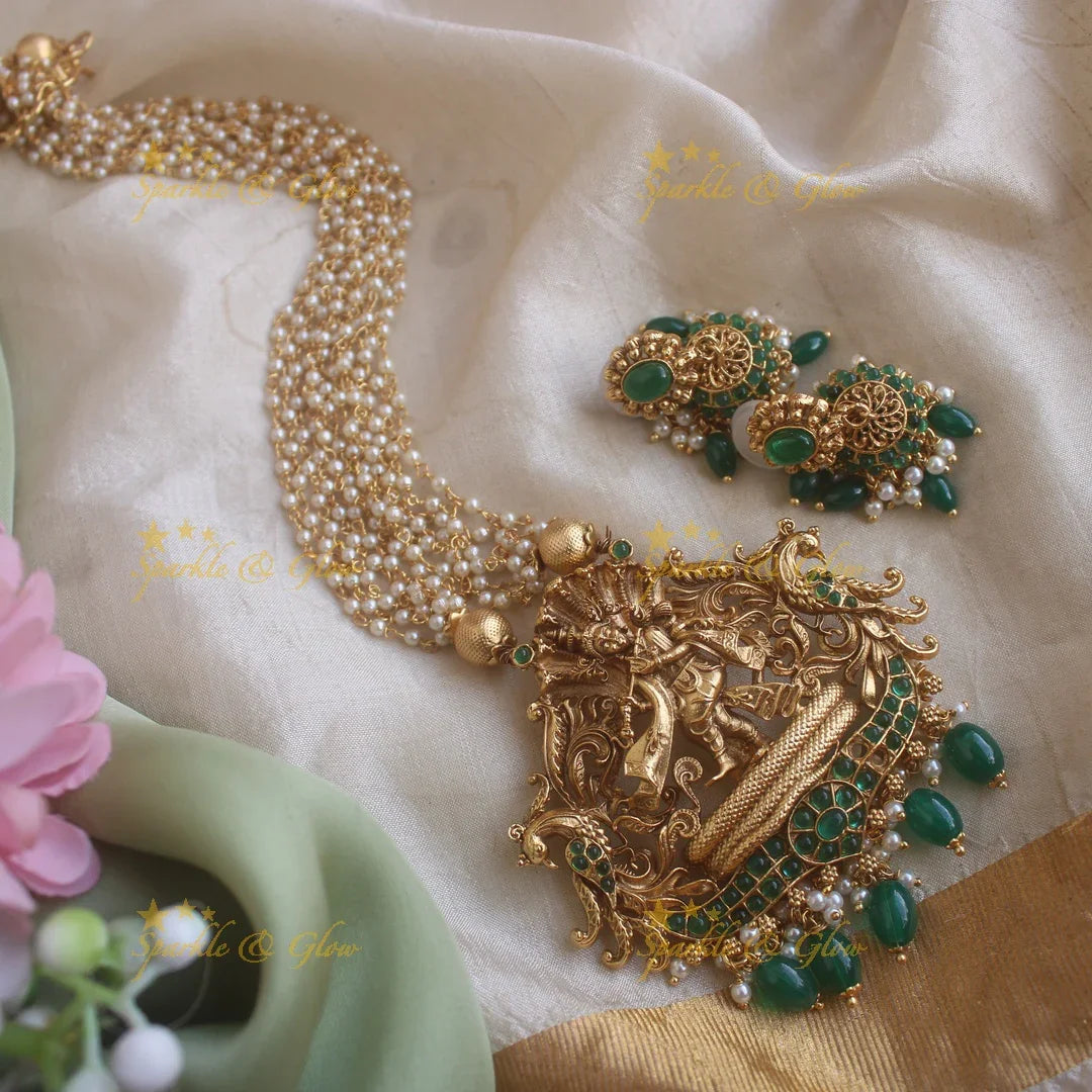 Exquisite Kalinga Mardhan Krishna carved pendant haram with emerald multi layer pearl chain and green beads - Sparkle and Glow
