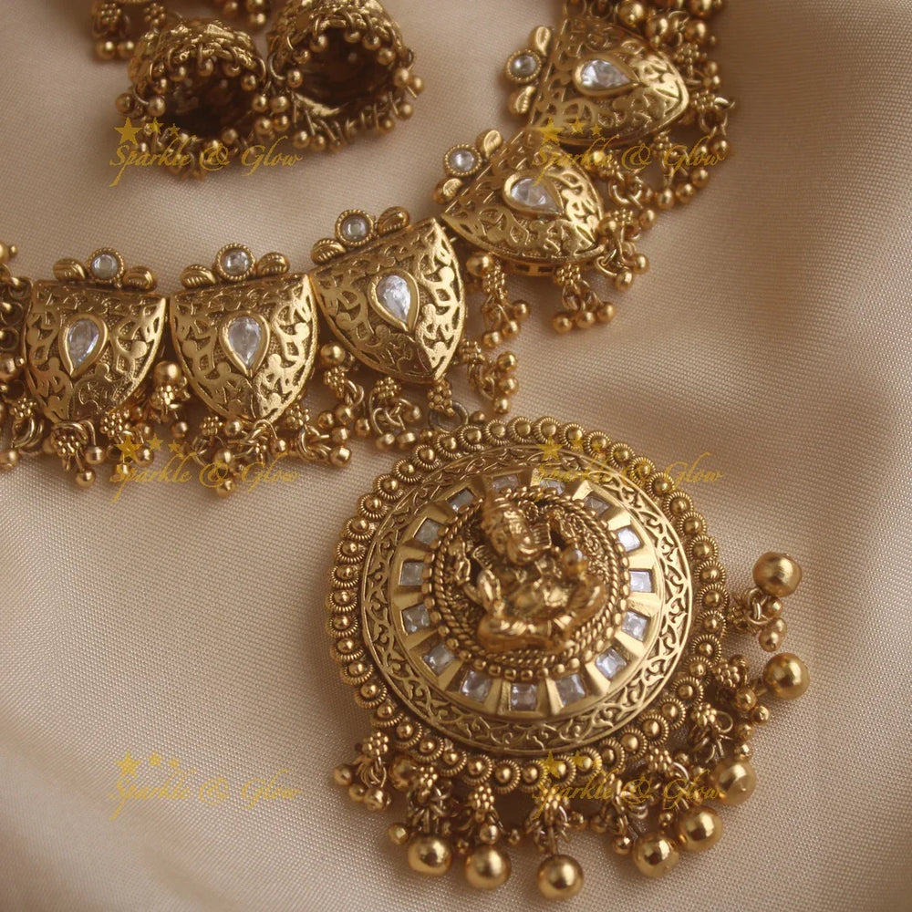 Stunning Ganesha carved pendant leaf design cluster gold short necklace with gold beads - Sparkle and Glow