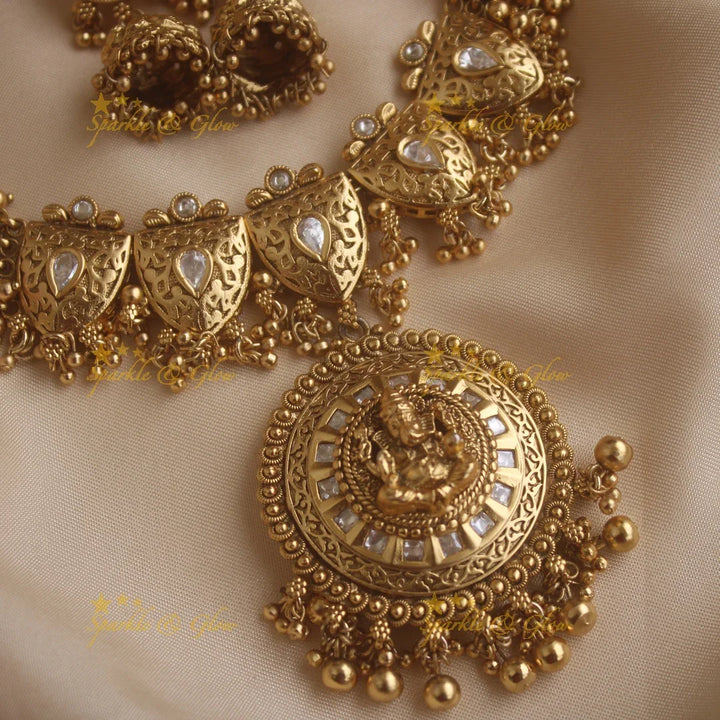 Stunning Ganesha carved pendant leaf design cluster gold short necklace with gold beads - Sparkle and Glow