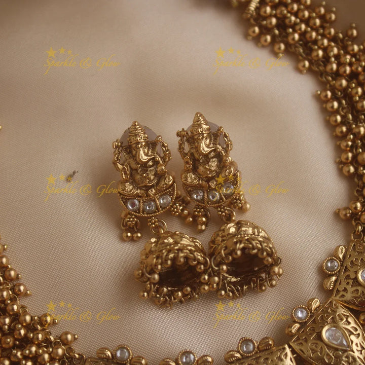 Stunning Ganesha carved pendant leaf design cluster gold short necklace with gold beads - Sparkle and Glow