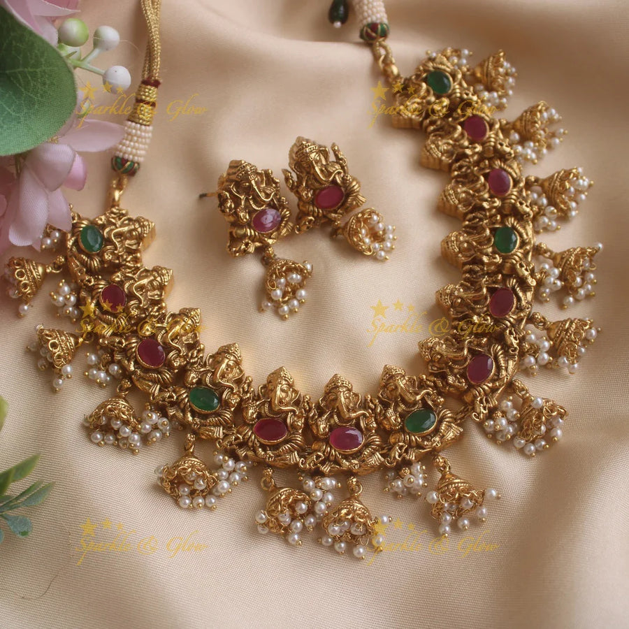 Elegant Ganesha carved short necklace with jhumuka drop with ruby emerald stones and pearls - Sparkle and Glow