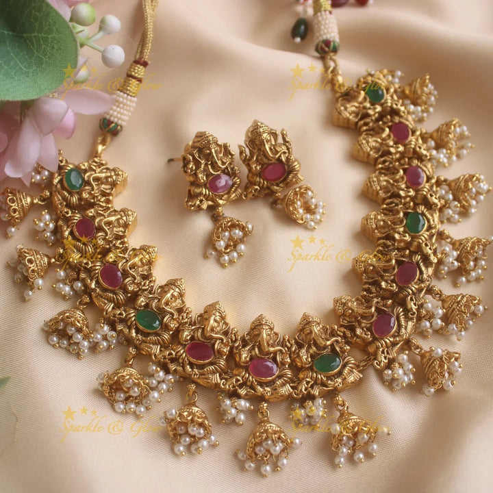 Elegant Ganesha carved short necklace with jhumuka drop with ruby emerald stones and pearls - Sparkle and Glow