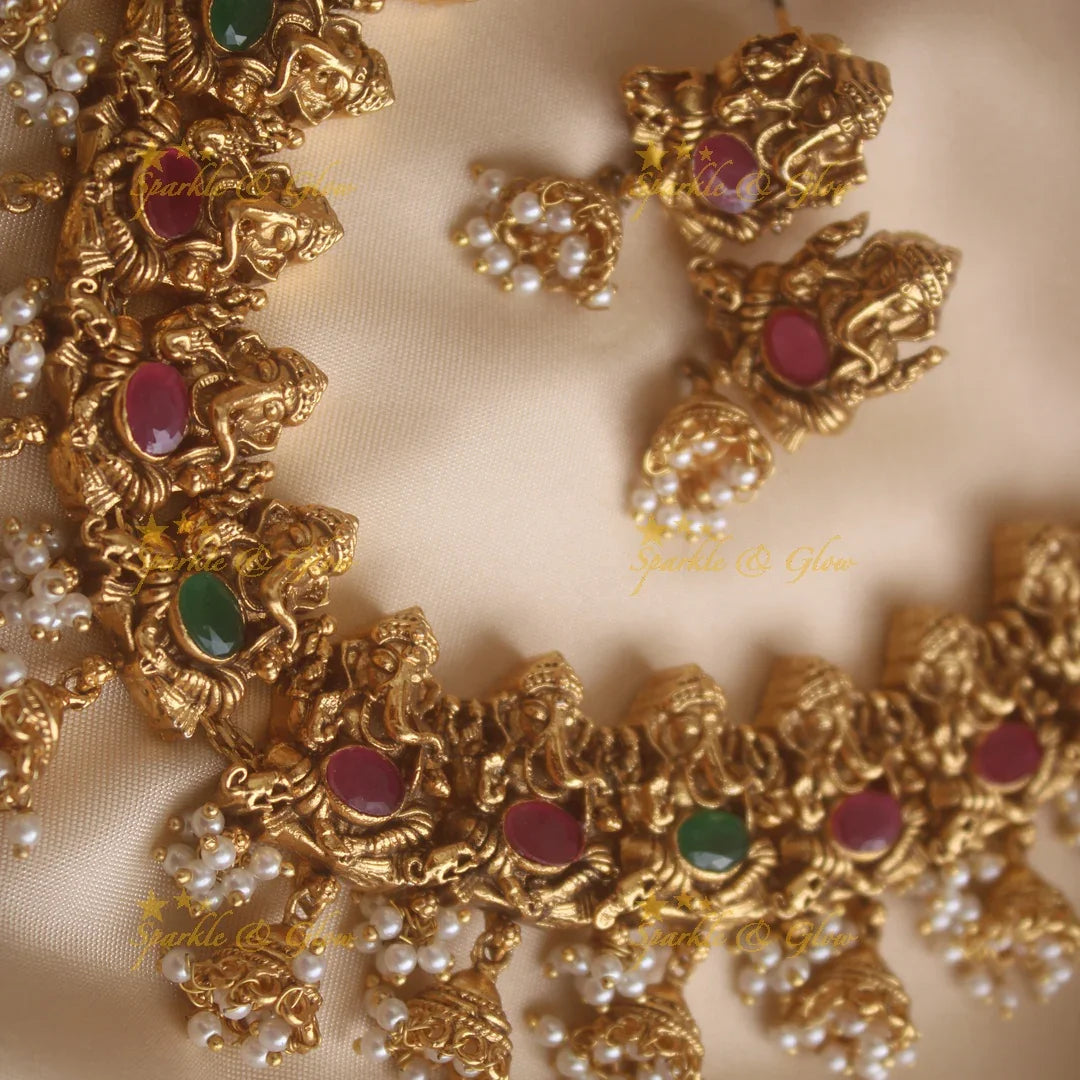 Elegant Ganesha carved short necklace with jhumuka drop with ruby emerald stones and pearls - Sparkle and Glow