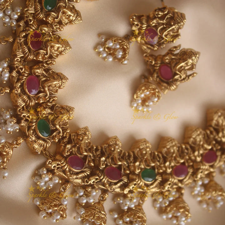 Elegant Ganesha carved short necklace with jhumuka drop with ruby emerald stones and pearls - Sparkle and Glow