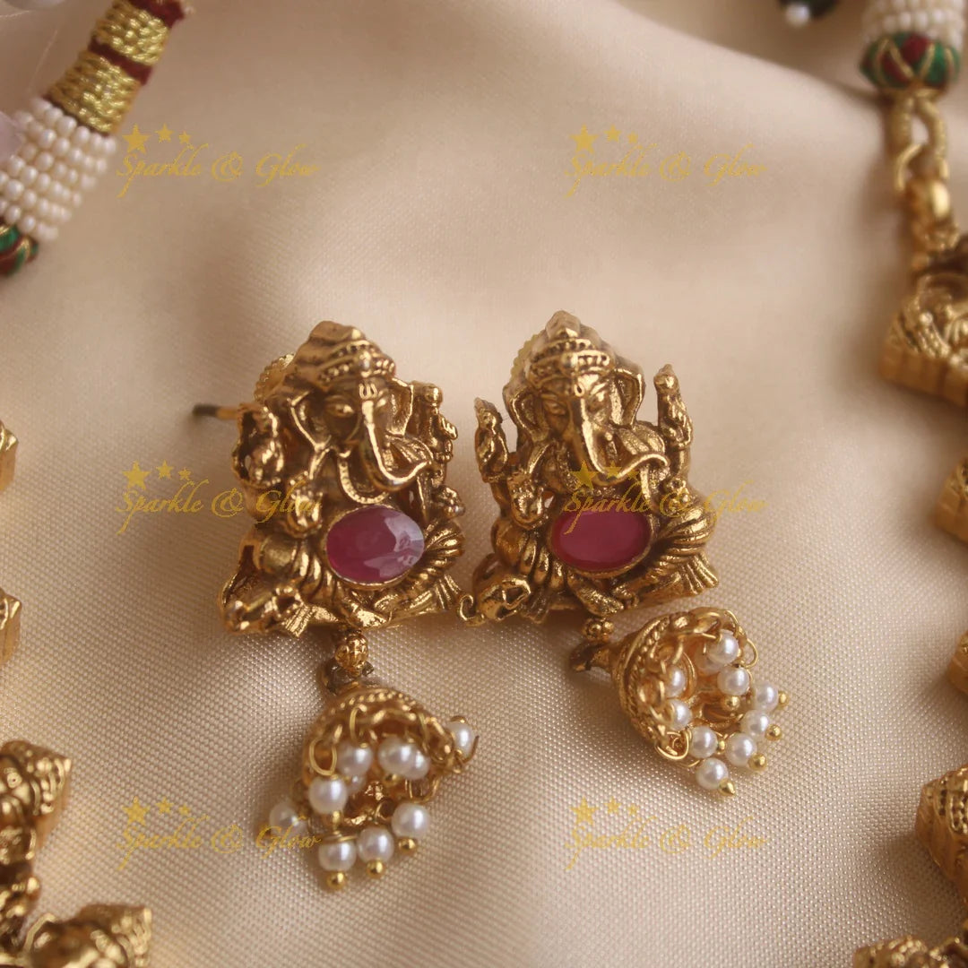 Elegant Ganesha carved short necklace with jhumuka drop with ruby emerald stones and pearls - Sparkle and Glow