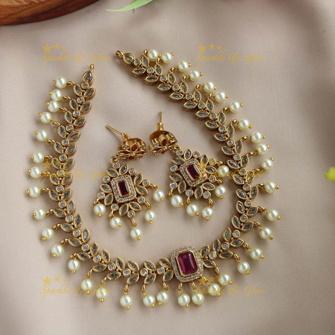 Elegant Leaflet design AD short necklace with ruby and pearl drops - Sparkle and Glow