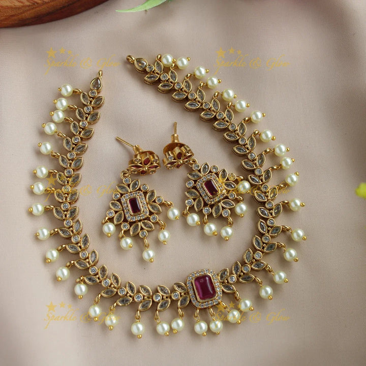 Elegant Leaflet design AD short necklace with ruby and pearl drops - Sparkle and Glow