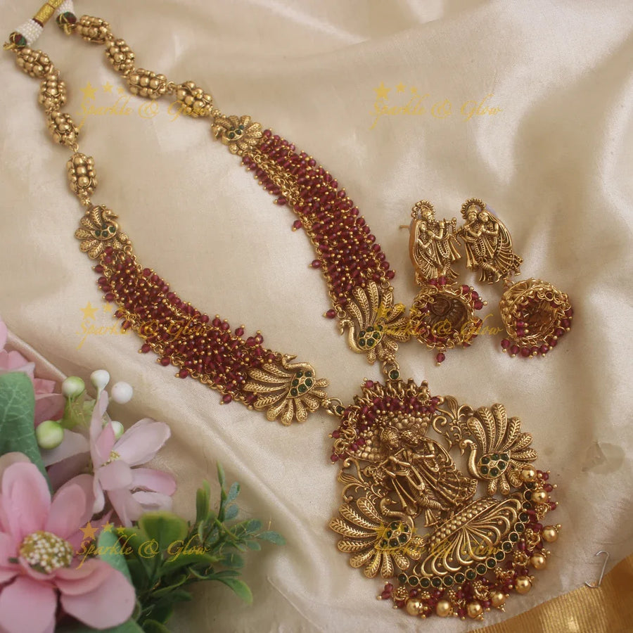 Grand Idol Radhakrishna Peacock design Haram with Red crystal beads - Sparkle and Glow