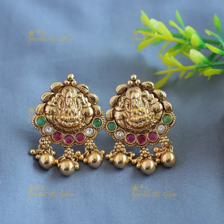 Gorgeous Lakshmi peacock carved pendant haram with multi layer gold and mint green beads - Sparkle and Glow