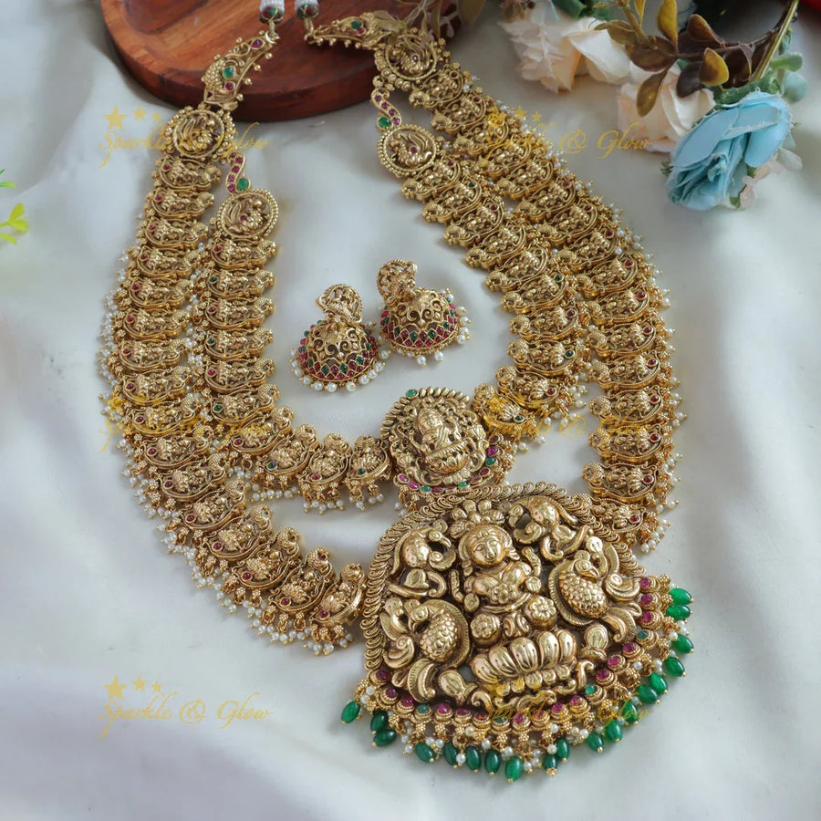 Exclusive Bridal Lakshmi peacock carved layer long necklace with ruby emerald pearls and green beads - Sparkle and Glow