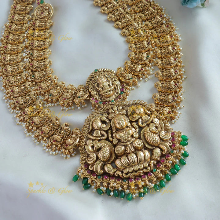 Exclusive Bridal Lakshmi peacock carved layer long necklace with ruby emerald pearls and green beads - Sparkle and Glow