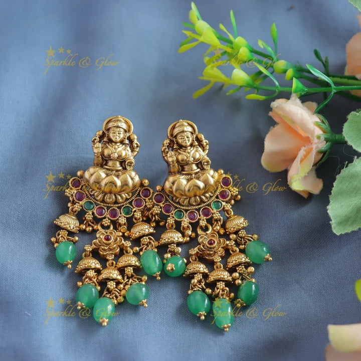 Elegant Lakshmi peacock floral design haram with multi layer gold and mint green beads - Sparkle and Glow