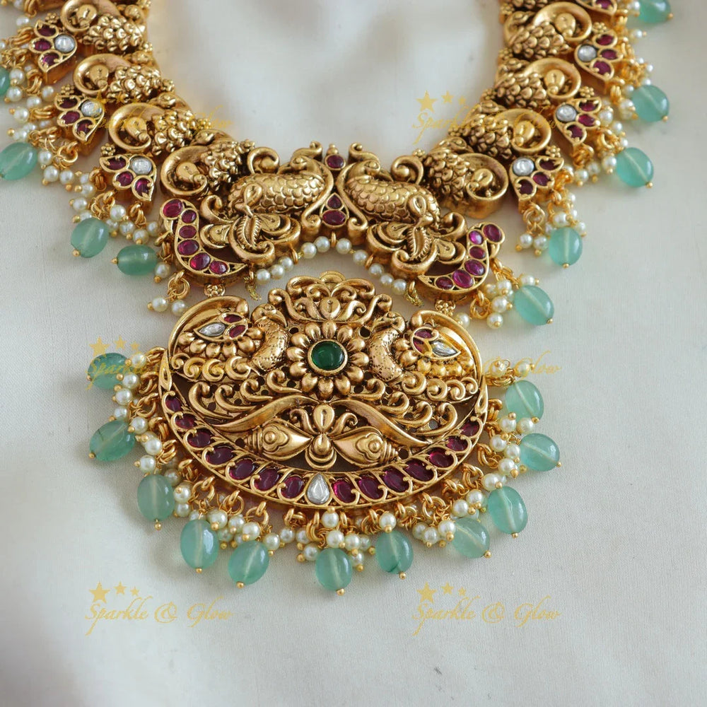 Stunning Peacock carved short necklace with ruby emerald pearls and mint green beads - Sparkle and Glow