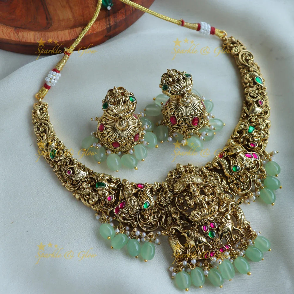 Beautiful Lakshmi Elephant peacock carved jadau short necklace with green beads - Sparkle and Glow