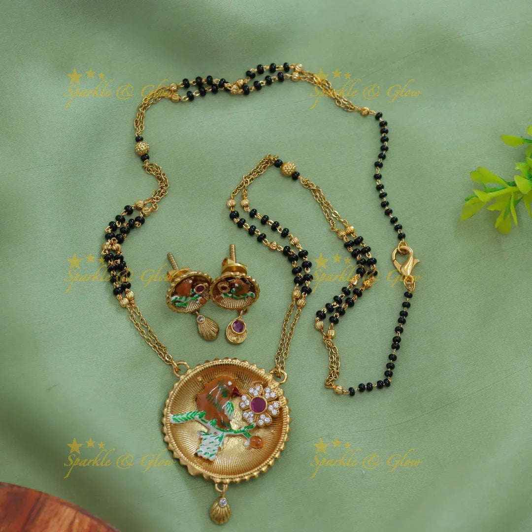 Statement Bird and floral design pendant two layer black beads chain , mangalsutra with ruby and white stones - Sparkle and Glow