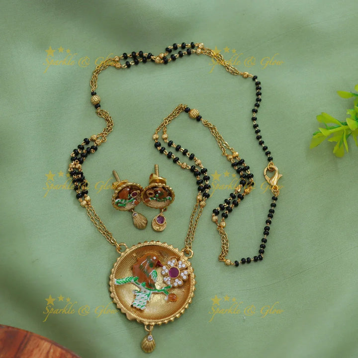 Statement Bird and floral design pendant two layer black beads chain , mangalsutra with ruby and white stones - Sparkle and Glow