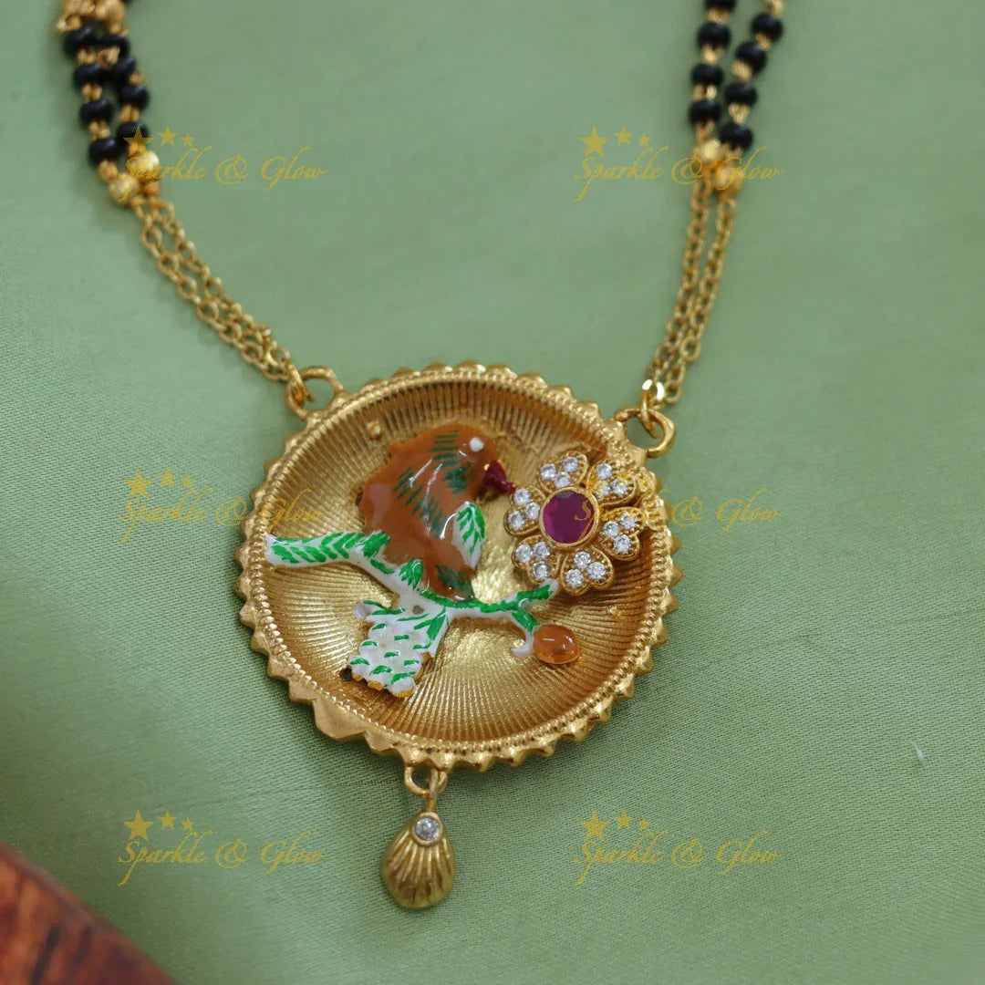Statement Bird and floral design pendant two layer black beads chain , mangalsutra with ruby and white stones - Sparkle and Glow