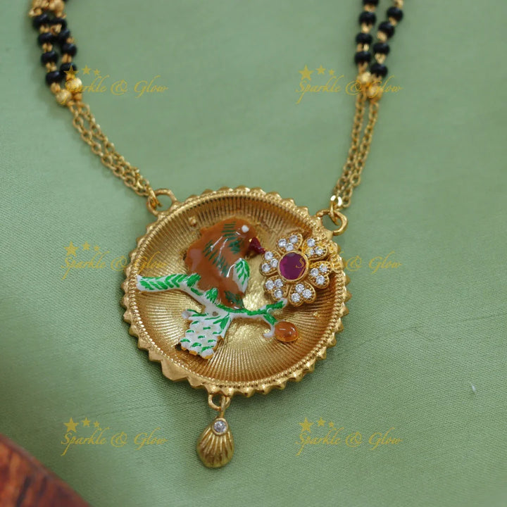 Statement Bird and floral design pendant two layer black beads chain , mangalsutra with ruby and white stones - Sparkle and Glow