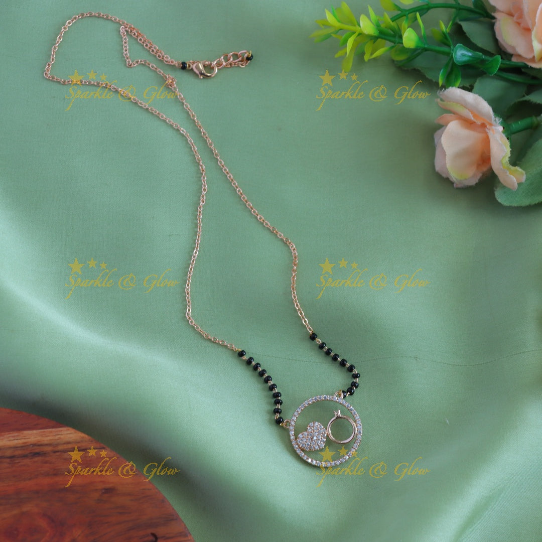 Beautiful Heart and ring design pendant black beads chain , mangalsutra with stones