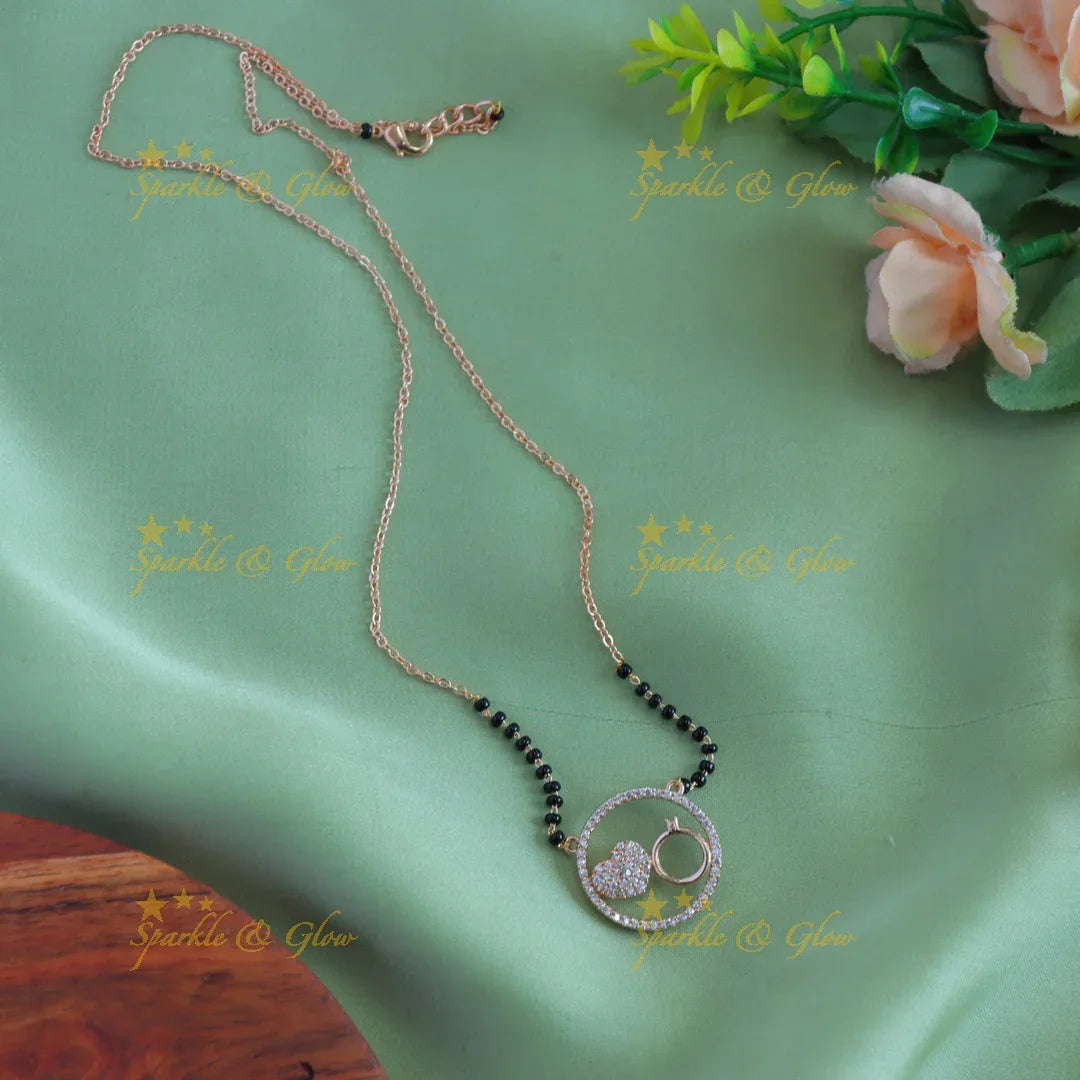 Beautiful Heart and ring design pendant black beads chain , mangalsutra with stones - Sparkle and Glow
