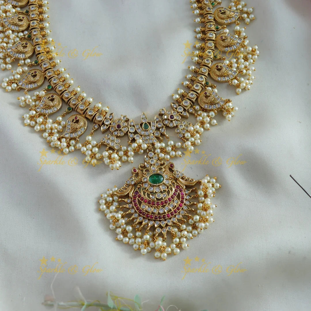 Gorgeous Mango peacock gutta pusalu haram with ruby emerald and CZ stones - Sparkle and Glow