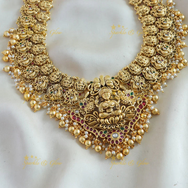 Grand Lakshmi peacock carved bridal long necklace with stones pearls and gold beads - Sparkle and Glow