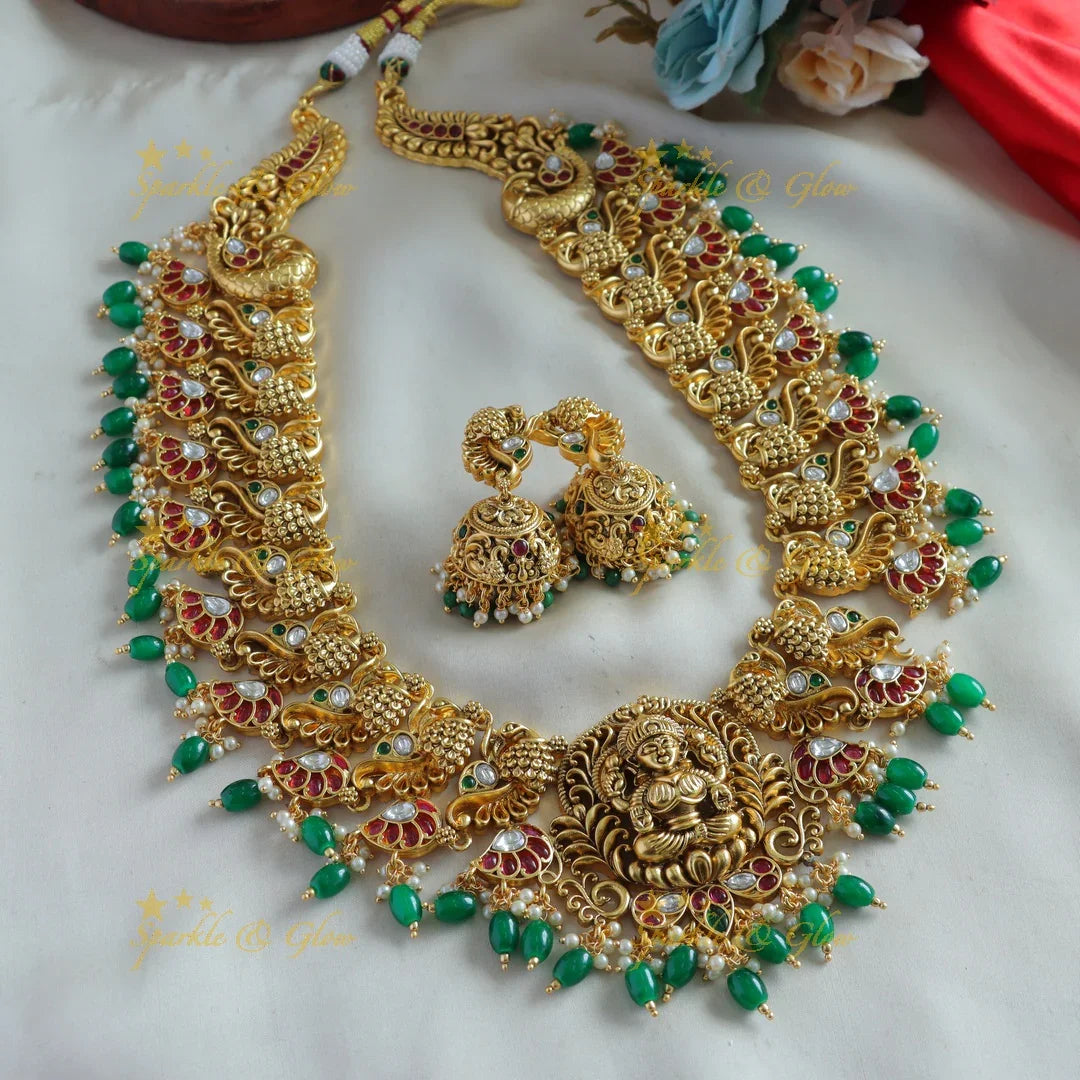 Exclusive Lakshmi peacock carved kemp stone long necklace with pearls and green beads - Sparkle and Glow